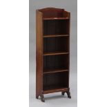 An Edwardian mahogany and inlaid narrow bookcase on bracket feet, height 117cm, width 41cm, depth