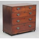 A George III mahogany chest of four graduated long drawers, height 81cm, width 87cm, depth 47cm (