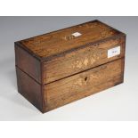 A mid-19th century Continental rosewood box, inlaid with initials and leaf sprays, the hinged lid