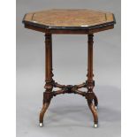 A late Victorian Aesthetic period walnut octagonal occasional table with ebonized decoration, on