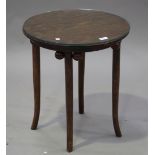 A 20th century stained bentwood table, in the manner of Josef Hoffmann, the circular top above