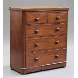 A Victorian mahogany chest of two short and three long drawers, on bun feet, height 112cm, width