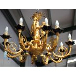 A pair of late 20th century gilded cast metal ten branch chandeliers, the central stems with