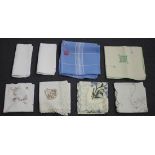 A collection of assorted whitework, including damask and linen tablecloths. Buyer’s Premium 29.4% (