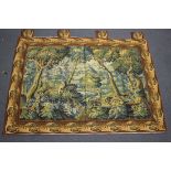 A late 20th century Aubusson style tapestry wall hanging, depicting a woodland landscape with birds,