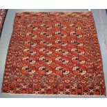 A Tekke rug, West Turkestan, late 19th/early 20th century, the red field with four columns of six