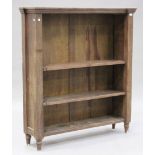 A 19th century French oak open bookcase, fitted with adjustable shelves, on turned feet, height