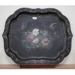 A Victorian papier-mâché tray, decorated with an exotic bird amongst foliage, width 66cm. Buyer’s