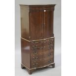 A 20th century reproduction mahogany serpentine fronted side cabinet, height 153cm, width 72cm,