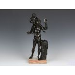 After the antique - a 19th century brown patinated cast bronze figure group of a faun with the