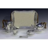 A Picquot ware five piece tea service, comprising teapot, hot water jug, milk jug, sugar bowl and