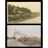 A photographic postcard titled 'Longmoor Station', together with another photographic postcard of