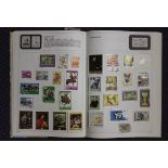 A collection of world stamps in nine albums, together with some loose first day covers.Buyer’s