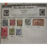 Six albums of world stamps, including a Lincoln album and a Queen album, together with some loose in