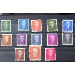 A collection of world stamps within six albums and two folders, containing Australia and States,
