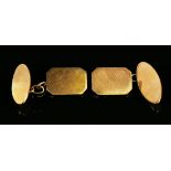 A pair of 9ct gold cufflinks, each cut cornered rectangular front with an oval back, London 1942.