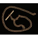 An 18ct gold curblink watch Albert chain, fitted with an 18ct gold T-bar, length 38.5cm.Buyer’s