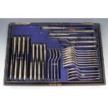 A Mappin & Webb plated part canteen of cutlery with ribbon and reeded handles, comprising eight