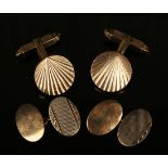 A pair of 9ct gold cufflinks, each circular front with sun ray decoration and folding bar