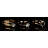An 18ct gold and diamond single stone ring, mounted with a circular cut diamond, the shank fitted