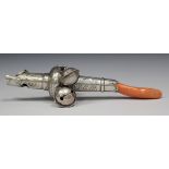 A George IV silver child's rattle with engraved foliate decoration, whistle terminal and coral