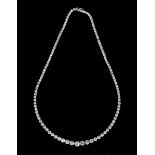 A diamond necklace, claw set with a row of one hundred and thirteen circular cut diamonds graduating