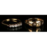 A gold and diamond five stone ring, mounted with a row of graduated cushion shaped diamonds,