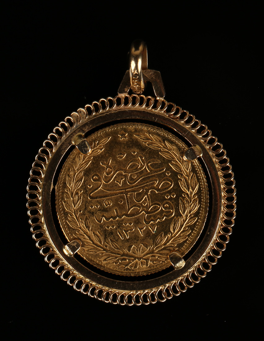 A Turkish gold one hundred kurush in a gold pendant mount, the suspension loop detailed '750', - Image 2 of 2