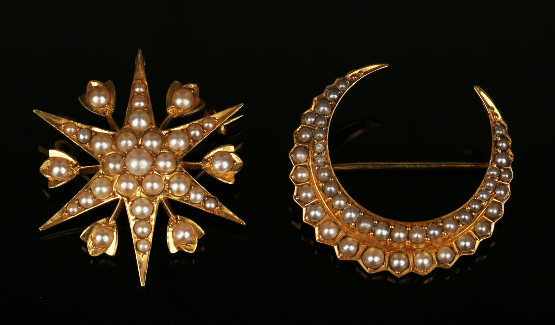 A gold and seed pearl brooch, designed as a six-pointed star alternating with six flower motifs,