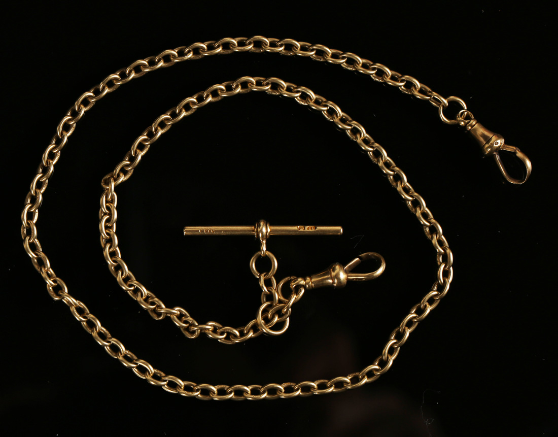 An 18ct gold oval link watch Albert chain, fitted with an 18ct gold T-bar and two 18ct gold swivels,