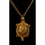 A Chinese gold pendant, designed as a tortoise, with a 24ct gold curblink neckchain with a
