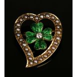 A gold, green enamelled, diamond and seed pearl brooch, designed as an open witch's heart with a