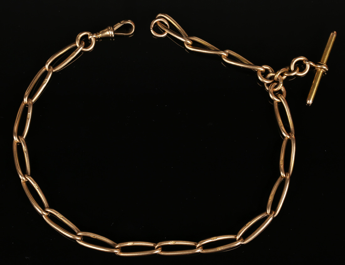 An 18ct gold open curblink watch Albert chain, fitted with an 18ct gold T-bar and an 18ct gold