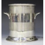 A George VI silver soda syphon of two-handled cylindrical form with engine turned banded decoration,