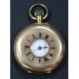 A gold keyless wind half-hunting cased gentleman's pocket watch, with an unsigned jewelled lever