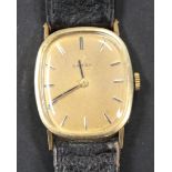 An Omega gilt metal curved rectangular cased gentleman's wristwatch, the signed movement numbered '
