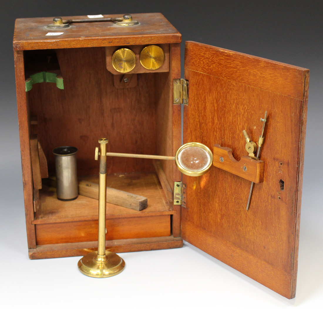 A late 19th century lacquered and black enamelled brass monocular microscope, unsigned, with rack - Image 2 of 3