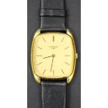 A Longines gilt metal fronted and steel backed cushion shaped gentleman's wristwatch, the signed