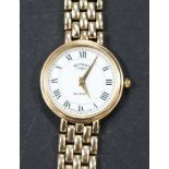 A Rotary Quartz 9ct gold lady's bracelet wristwatch, the signed circular white dial with black Roman