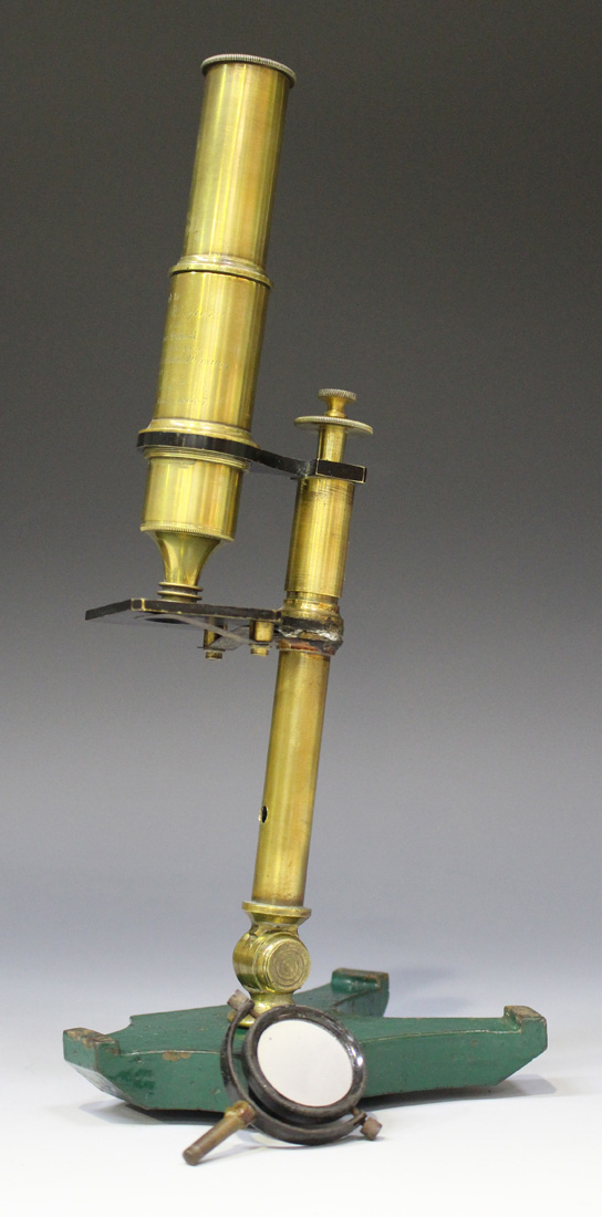 A mid-19th century brass monocular microscope with engraved presentation inscription, on a green - Image 5 of 5