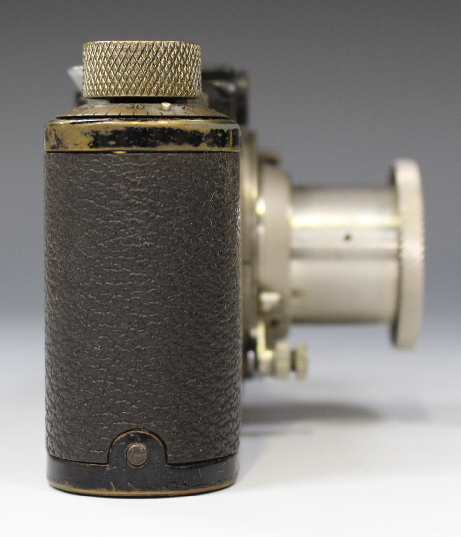 A Leica I camera, circa 1930, No. 45778, with Elmar f=5cm 1:3.5 lens, together with a group of - Image 4 of 5