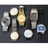 Seven gentlemen's wristwatches, including Seiko 5 Automatic, Tissot, Junghans and Elco.Buyer’s