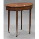 An Edwardian satinwood and inlaid oval occasional table, raised on square tapering legs and brass