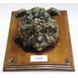 A late 19th century Austrian cold painted cast bronze desk tidy in the form of a dog's head,