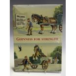 A mid-20th century printed celluloid Guinness advertising board, depicting an amusing scene of a