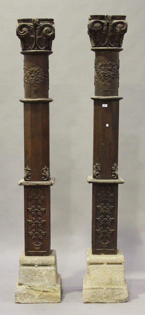 A pair of late 19th/early 20th century carved teak architectural columns, both decorated in relief