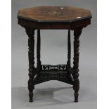 A late Victorian rosewood and foliate inlaid octagonal occasional table, raised on simulated