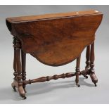 A mid-Victorian walnut Sutherland table, the shaped top raised on turned supports and bracket