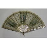 A 19th century French mother-of-pearl folding fan, the net panel painted with a scene of a