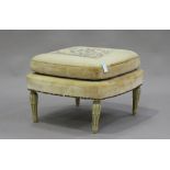 An early 20th century French stool with tapestry cushion and overstuffed seat, on painted legs,